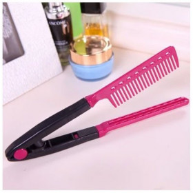 Pink V shape straightening comb (used for Brazilian straightening)