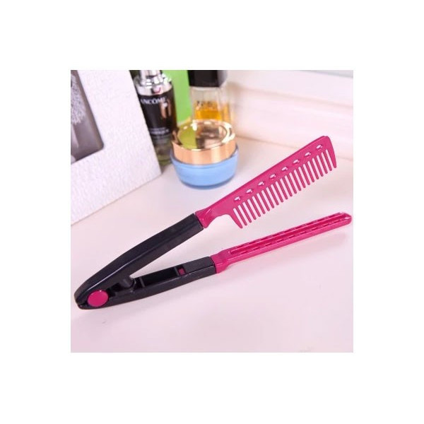 Pink V shape straightening comb (used for Brazilian straightening)